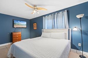 Postel nebo postele na pokoji v ubytování Gulf View 23