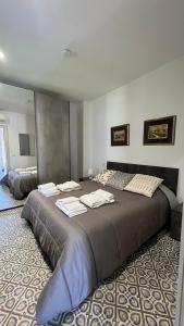 Postel nebo postele na pokoji v ubytování La casa di Nonna Rosa