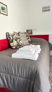 Postel nebo postele na pokoji v ubytování La casa di Nonna Rosa