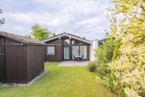 Κήπος έξω από το Ferienwohnpark Immenstaad am Bodensee Satteldachhaus Typ 9 SD 55