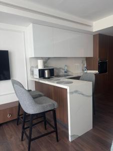 Kuchyň nebo kuchyňský kout v ubytování Grand Saphire Resort Apartment-I