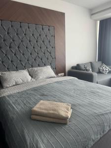 Postel nebo postele na pokoji v ubytování Grand Saphire Resort Apartment-I + 9 fotografií