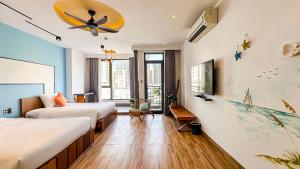 Una cama o camas en una habitación de Seavista Apartment Da Nang