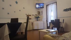 TV a/nebo společenská místnost v ubytování Hotel Canarco