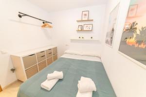 Postel nebo postele na pokoji v ubytování Adosado Nuevo con Piscina, Playa, Garaje y Jardín