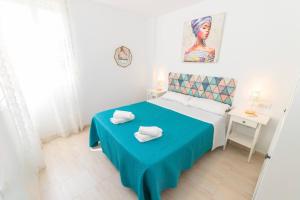 Postel nebo postele na pokoji v ubytování Adosado Nuevo con Piscina, Playa, Garaje y Jardín + 30 fotografií