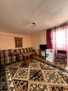 Een TV en/of entertainmentcenter bij Кипарис
