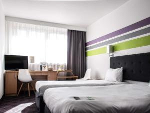 Postel nebo postele na pokoji v ubytování ibis Styles Bielsko Biala