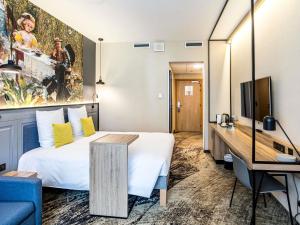 Telewizja i/lub zestaw kina domowego w obiekcie Mercure Wrocław Centrum