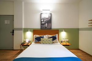 Postel nebo postele na pokoji v ubytování Olive Hotel Magrath by Embassy Group + 37 fotografií