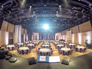a large room with tables and chairs in it at Scandic Lillehammer Hotel in Lillehammer +34 photos
