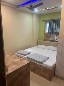Postel nebo postele na pokoji v ubytování Hotel Globe International