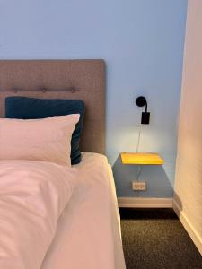 Voodi või voodid majutusasutuse Hotel Birksø toas