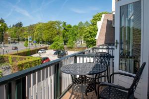 Balkón nebo terasa v ubytování Bastion Hotel Apeldoorn Het Loo