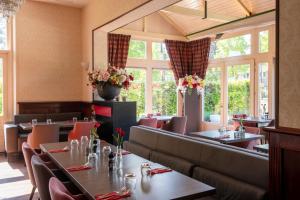 Restaurace v ubytování Bastion Hotel Apeldoorn Het Loo
