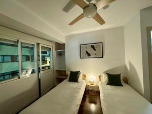 A bed or beds in a room at Apartamento del Mar