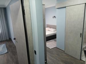 Postel nebo postele na pokoji v ubytování Hotel Tahar