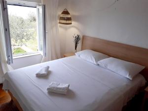 Postel nebo postele na pokoji v ubytování Casa Carlena