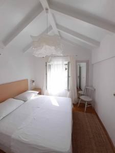 Postel nebo postele na pokoji v ubytování Casa Carlena