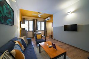 TV a/nebo společenská místnost v ubytování Olive Hotel Magrath by Embassy Group