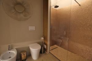 Kúpeľňa v ubytovaní Domus 21 Luxury Suites