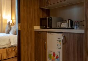 Kuchyň nebo kuchyňský kout v ubytování Golden Tower Hotel Al Khobar Corniche