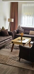 Posezení v ubytování Value Living Apartment