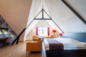 Postel nebo postele na pokoji v ubytování Bastion Hotel Apeldoorn Het Loo