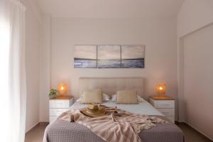 Postel nebo postele na pokoji v ubytování Seas The Day - Beachfront, Amazing Sea Views + 14 fotografií