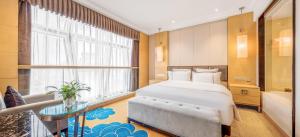 Voodi või voodid majutusasutuse Lyhn International Hotel Chengdu Taikoo Li toas