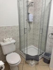 a bathroom with a shower and a toilet at New Crown Inn Bath in Bath