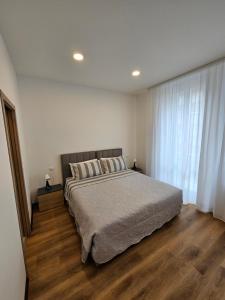 Postel nebo postele na pokoji v ubytování B&B Lunis