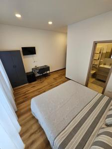 TV a/nebo společenská místnost v ubytování B&B Lunis