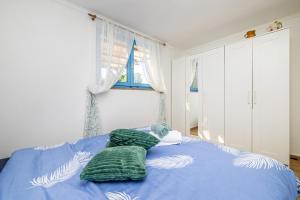 Łóżko lub łóżka w pokoju w obiekcie Holiday house Depope