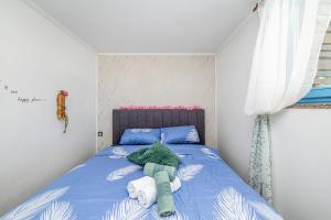 Łóżko lub łóżka w pokoju w obiekcie Holiday house Depope