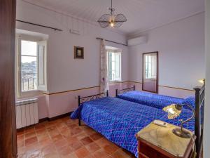 Voodi või voodid majutusasutuse La Suite di Arpino toas
