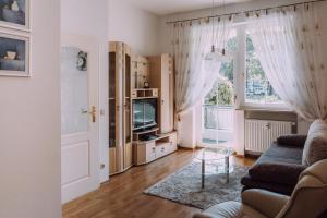 TV a/nebo společenská místnost v ubytování Europa Residenz Bad Füssing