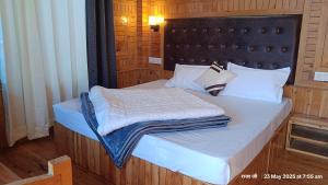 Voodi või voodid majutusasutuse Himalayan Heart Aashiyana toas