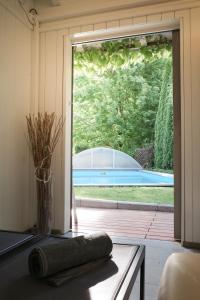 Πισίνα στο ή κοντά στο Golf Cocoon - Poolhaus am Golf Resort