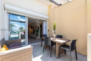 Гостиная зона в Cap d'Agde Studio - Village naturiste