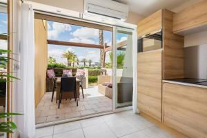 Балкон или терраса в Cap d'Agde Studio - Village naturiste
