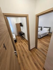 Postel nebo postele na pokoji v ubytování B&B Lunis