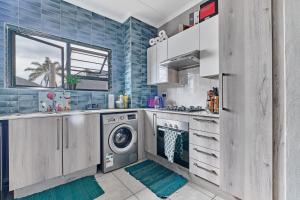 Η κουζίνα ή μικρή κουζίνα στο Luxury living at Canvas 82