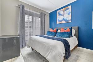 Ένα ή περισσότερα κρεβάτια σε δωμάτιο στο Luxury living at Canvas 82 +34 φωτογραφίες