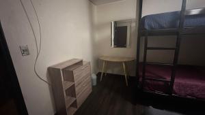 En eller flere senge i et værelse på Lindo Departamento