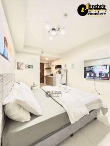 En eller flere senge i et værelse på horizons 101 tower 2 + 2 billeder