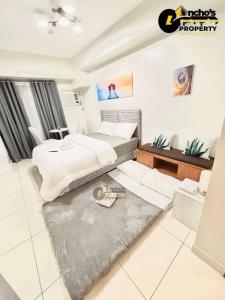 En eller flere senge i et værelse på horizons 101 tower 2