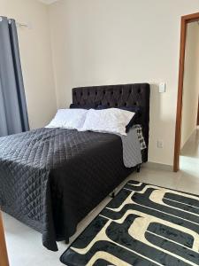 Postel nebo postele na pokoji v ubytování Casa e conforto com preço unico