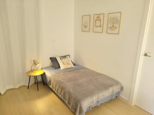 Ένα ή περισσότερα κρεβάτια σε δωμάτιο στο Aguamarina apartment - Relax by the sea