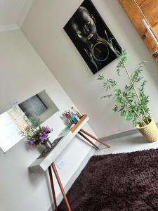 TV a/nebo společenská místnost v ubytování Casa e conforto com preço unico
